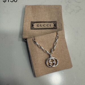 Gucci Silver Bracelet with Logo Charm